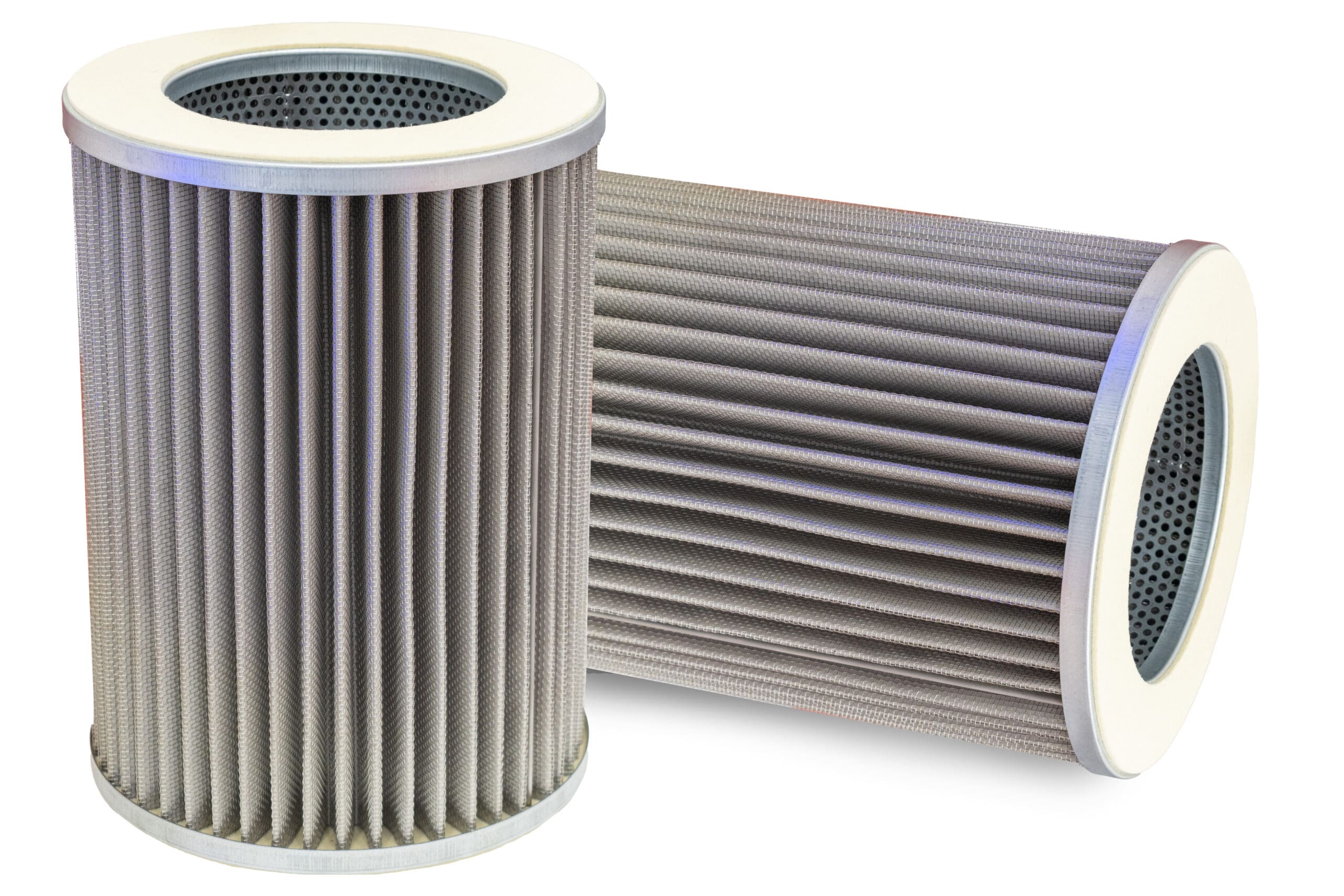 Close-up of pleated industrial air filters with metal end caps for dust and particulate removal