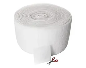 White cut-to-fit air filter media roll with scissors shown for custom sizing
