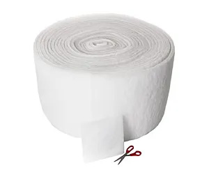 White air filter roll media with scissors shown for easy trimming to size